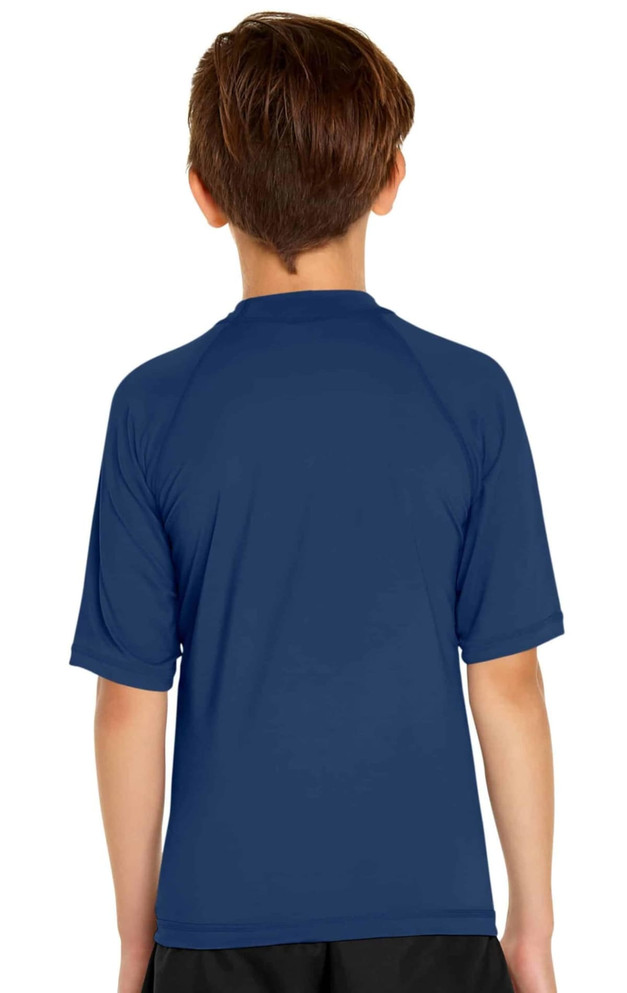 A navy blue youth short sleeve rashie with a round neckline and a logo on the back.