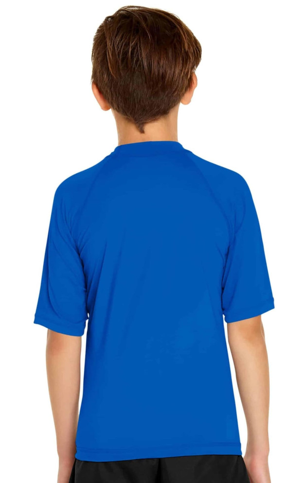 A youth short sleeve rashie in bright blue, featuring a simple design and a comfortable fit. It has a logo on the back.