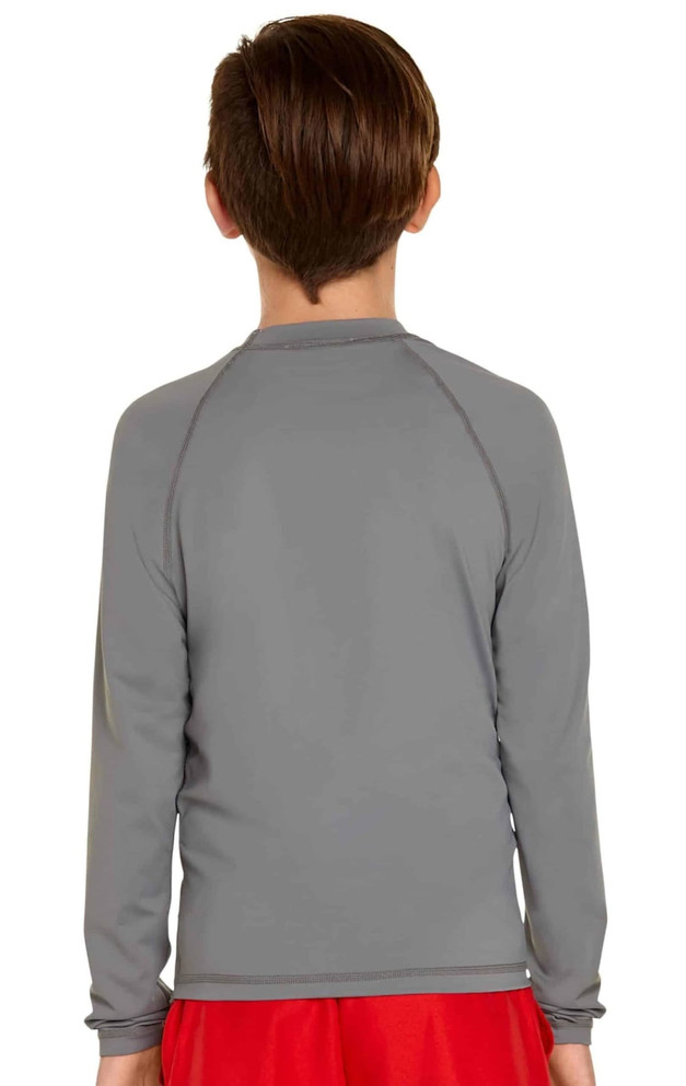A grey long sleeve rashie for youth, featuring a smooth fabric and a logo on the back.