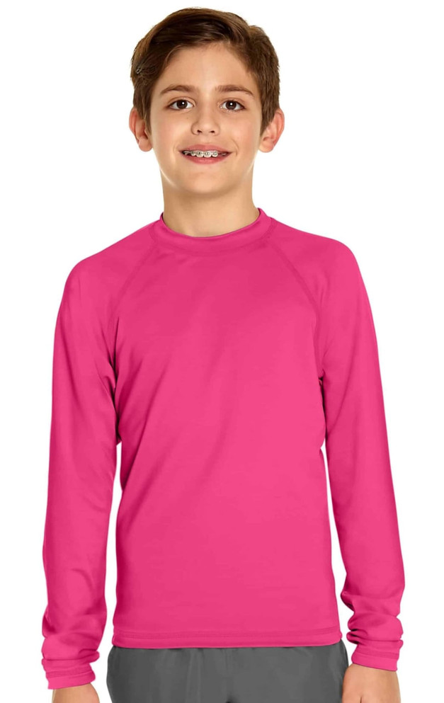 A long-sleeve rashie in bright pink, featuring UPF 50+ protection. The shirt has a simple design and includes a logo.
