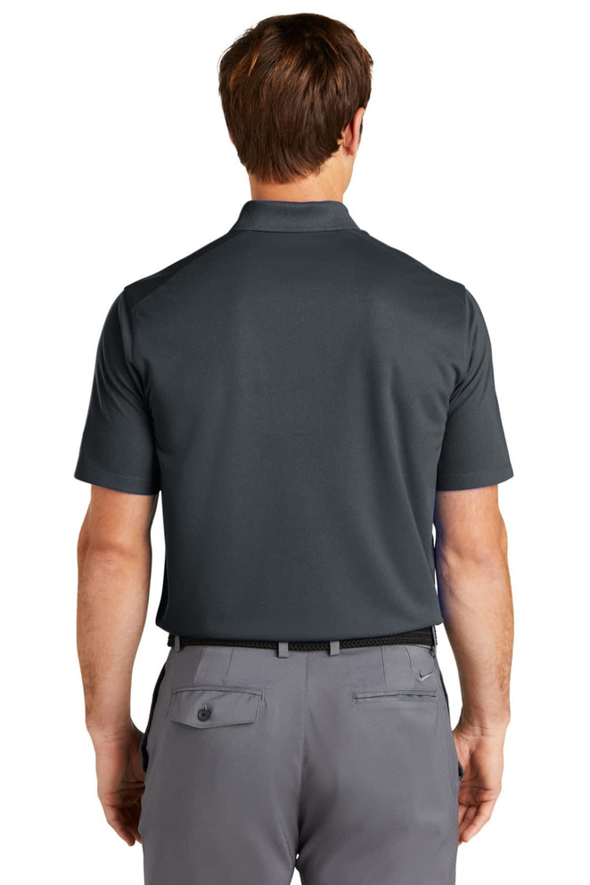 A back view of a dark grey polo shirt with short sleeves, featuring a pocket and a logo.