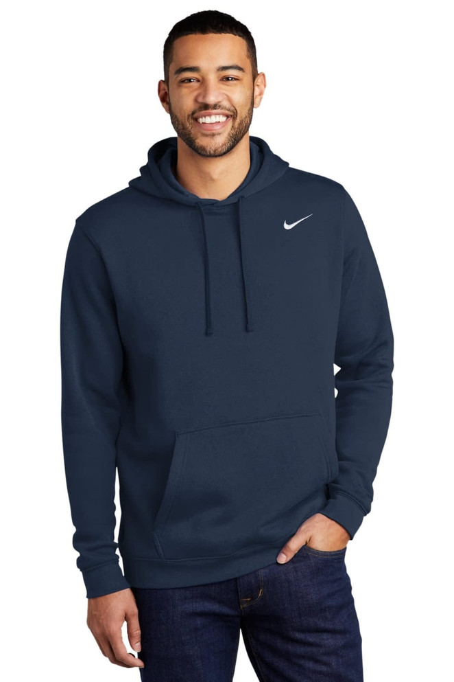 A navy blue Nike Club Fleece pullover hoodie with a front pocket and a logo on the chest. A navy blue Nike Club Fleece pullover hoodie with a front pocket and a logo on the chest.