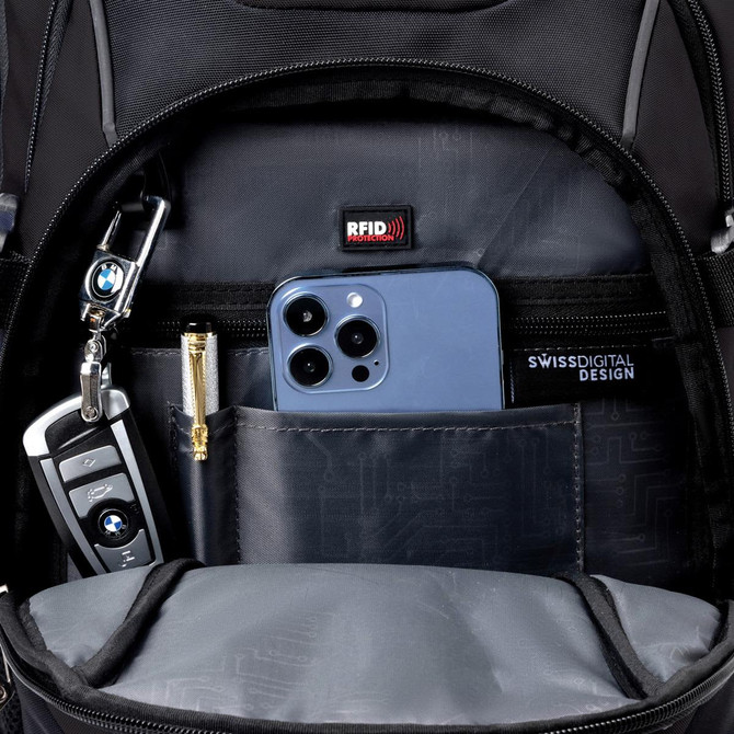 An open black backpack featuring compartments with a blue smartphone, a key, and a pen inside. An open black backpack featuring compartments with a blue smartphone, a key, and a pen inside.