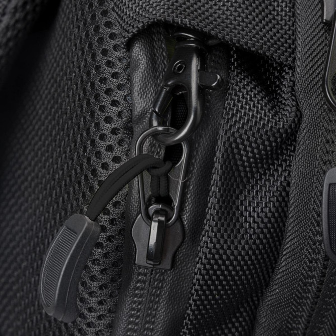 A close-up of a black backpack zipper, featuring a metal pull tab and textured fabric. It has a logo visible. A close-up of a black backpack zipper, featuring a metal pull tab and textured fabric. It has a logo visible.