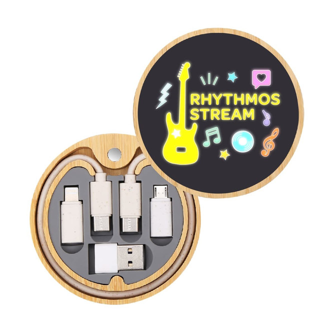 A circular wooden box containing four charging connectors in various sizes, designed for wireless charging. A circular wooden box containing four charging connectors in various sizes, designed for wireless charging.