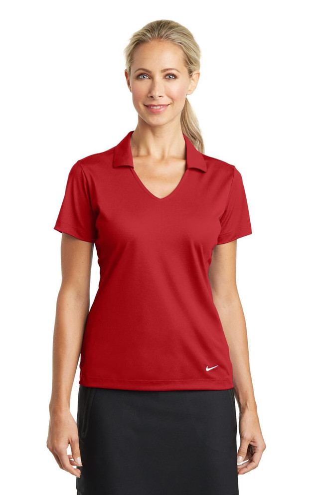 A red Nike Ladies Dri-FIT Vertical Mesh Polo shirt featuring a collared neckline and short sleeves, with a logo at the hem. A red Nike Ladies Dri-FIT Vertical Mesh Polo shirt featuring a collared neckline and short sleeves, with a logo at the hem.