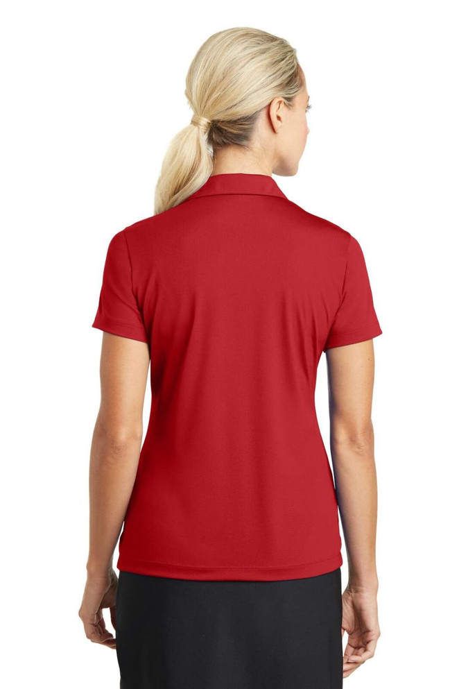 A red ladies' polo shirt featuring a mesh design and a logo on the back. A red ladies' polo shirt featuring a mesh design and a logo on the back.