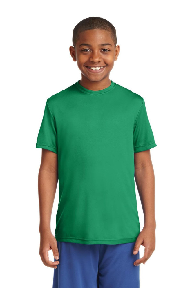 A green Youth PosiCharge Competitor Tee displayed on a smiling boy. The shirt has a logo on it. A green Youth PosiCharge Competitor Tee displayed on a smiling boy. The shirt has a logo on it.