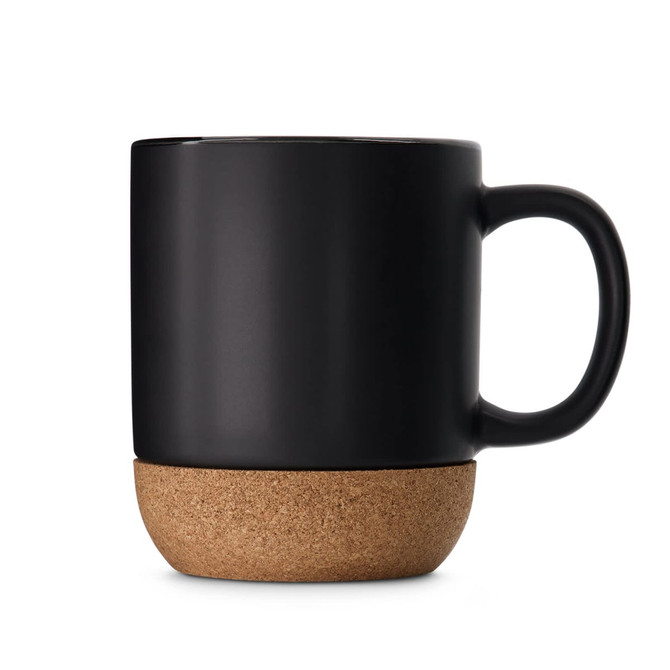 A ceramic mug with a matte black finish and a cork base. It features a single handle and branding.