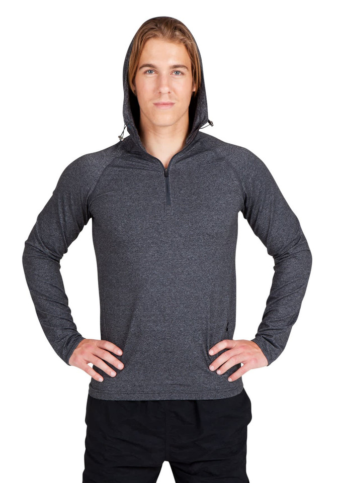 A grey men's half-hood top with a zippered neck and a snug fit. The model stands with hands on hips, showcasing the design.