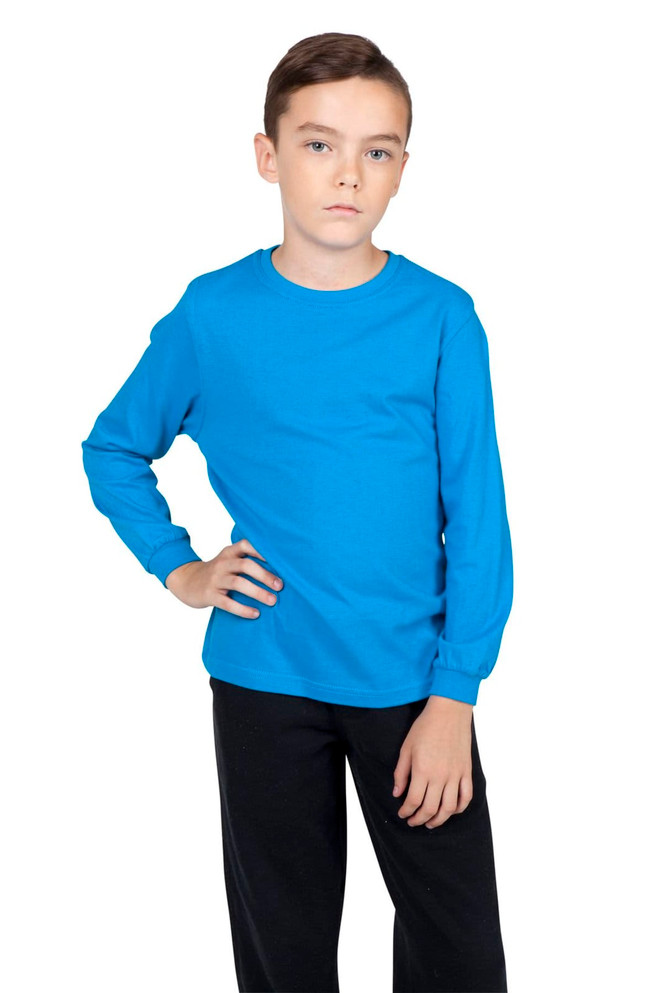 A blue long sleeve T-shirt on a child, paired with black trousers. The shirt features a logo on the front.