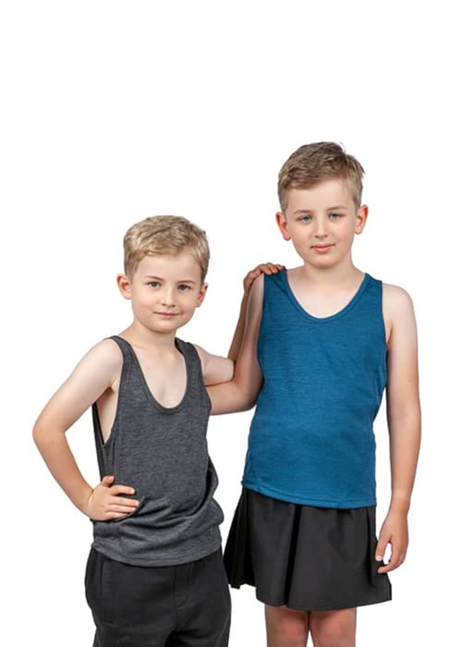 Two boys wearing singlets: one in grey and the other in blue, standing against a white background. Two boys wearing singlets: one in grey and the other in blue, standing against a white background.