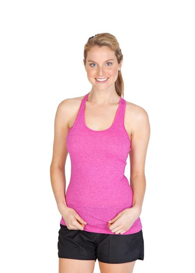 A pink athletic T-back singlet with a fitted design, worn by a smiling model. The product features a logo. A pink athletic T-back singlet with a fitted design, worn by a smiling model. The product features a logo.