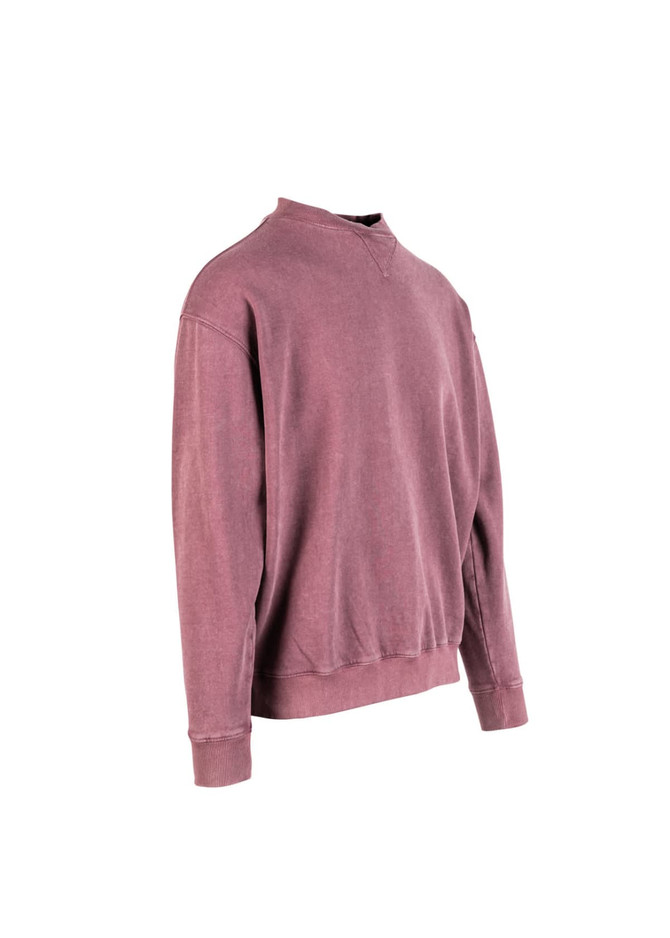 A unisex stone wash sweatshirt in a muted mauve colour, featuring a simple design and a logo.