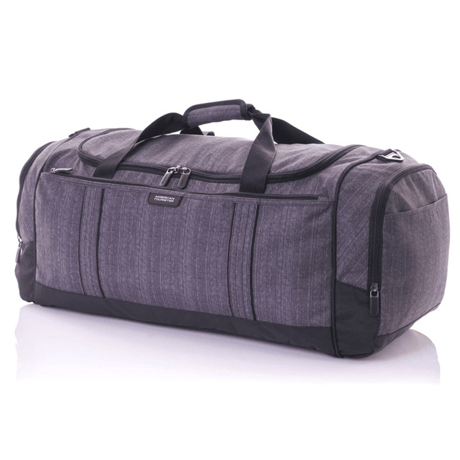 A grey duffle bag with multiple compartments, featuring a sturdy handle and a sleek design, includes branding.