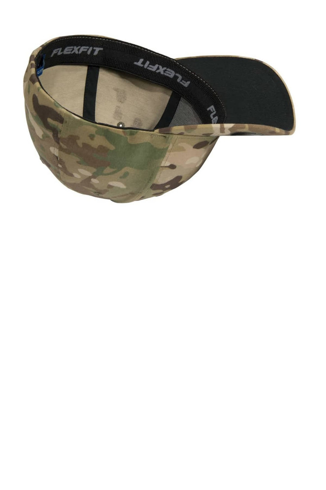 A camouflage cap with a flexible fit and an interior label, showing its underside and structure.