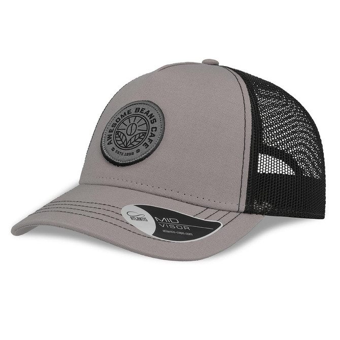 A grey cap with a black mesh back and a circular logo on the front. It features a curved brim and a branded label.