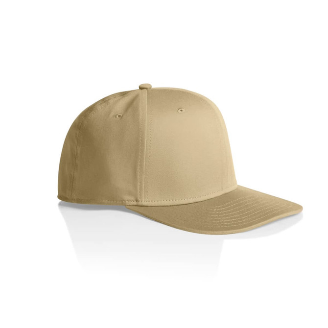 A beige Stock Flex Cap with a flat brim and an adjustable back, featuring a logo on the front.