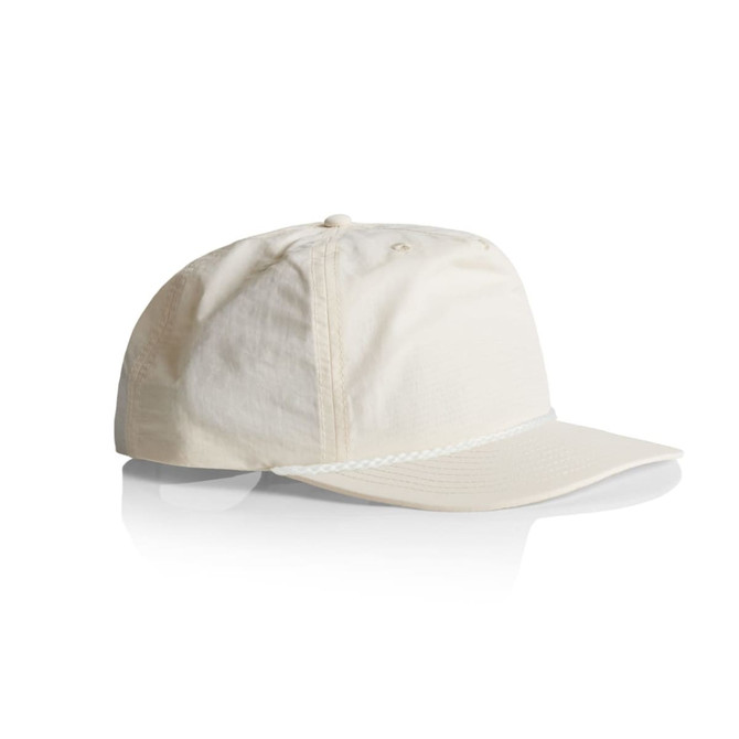 A light cream cap with a white band, featuring a logo on the front. The cap has a curved brim and is made of fabric.