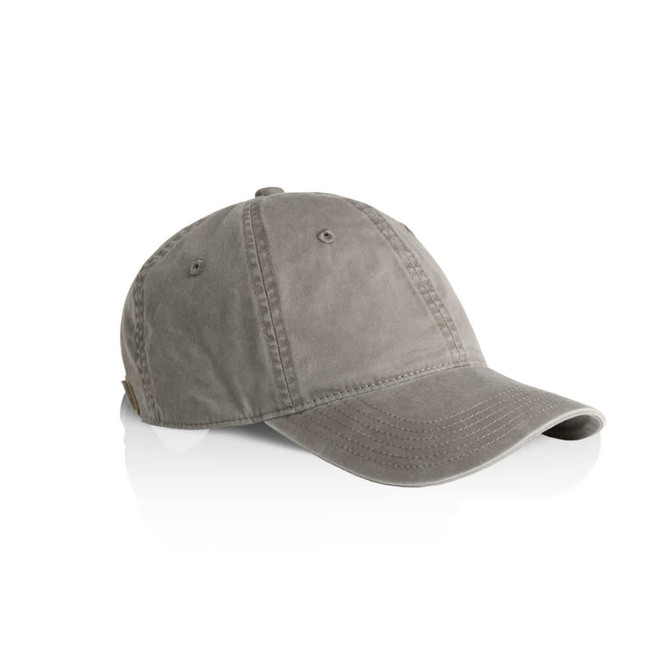 A faded cap in a muted grey colour, featuring a logo on the side, displayed at an angle.