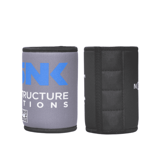 A stubby holder in grey and black, featuring a logo. Designed for keeping drinks cool.
