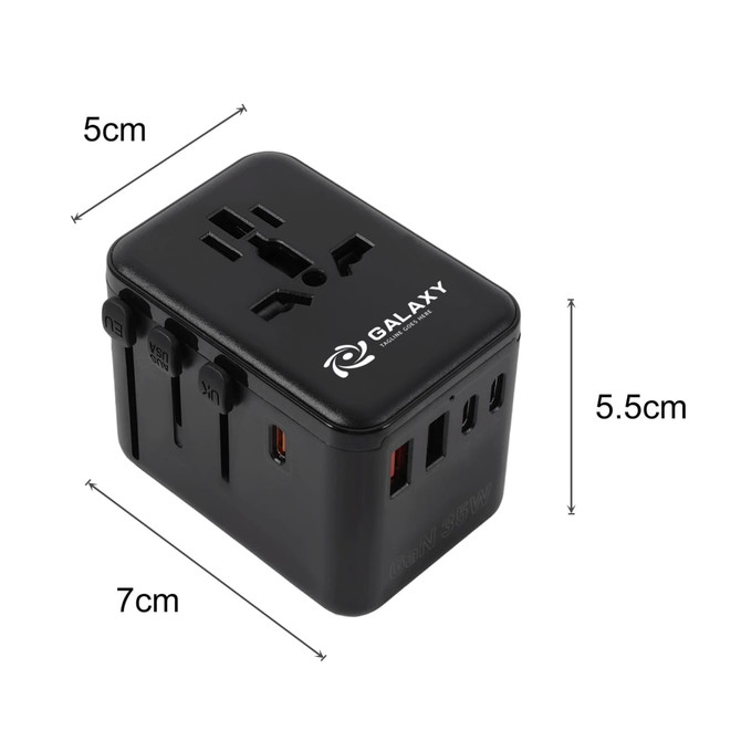 A black universal travel adapter with multiple ports and a logo, measuring 5cm by 5.5cm by 7cm.