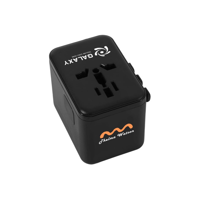 A black universal travel adapter with multiple ports and a logo on top.
