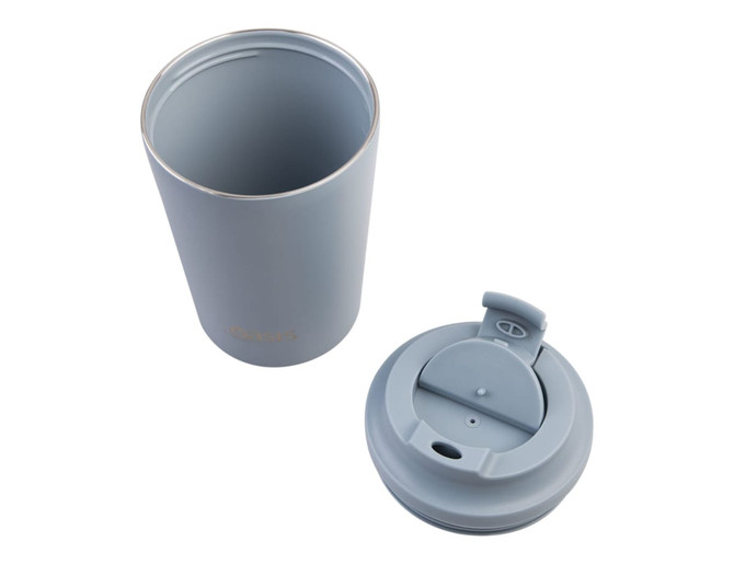 A ceramic lined insulated coffee cup in light blue, featuring a removable lid with a secure opening and a logo.