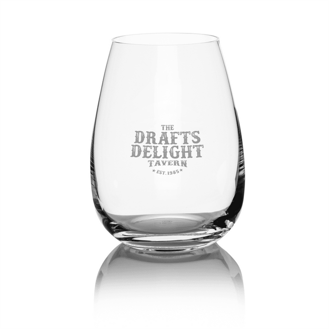 A stemless wine glass with a clear design, featuring an engraved logo and a smooth, rounded shape.