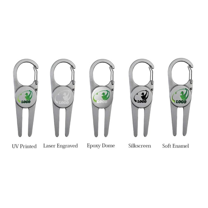 A set of five silver golf tools with carabiners, featuring different marker designs and a logo on each.