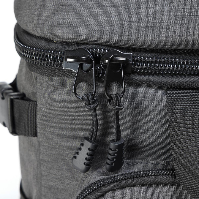 A grey backpack cooler featuring dual black zippers with textured pull tabs for easy access.