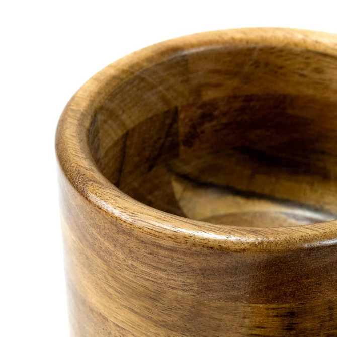 A wooden mortar featuring a smooth, polished interior and rounded lip, showcasing rich wood grain textures.