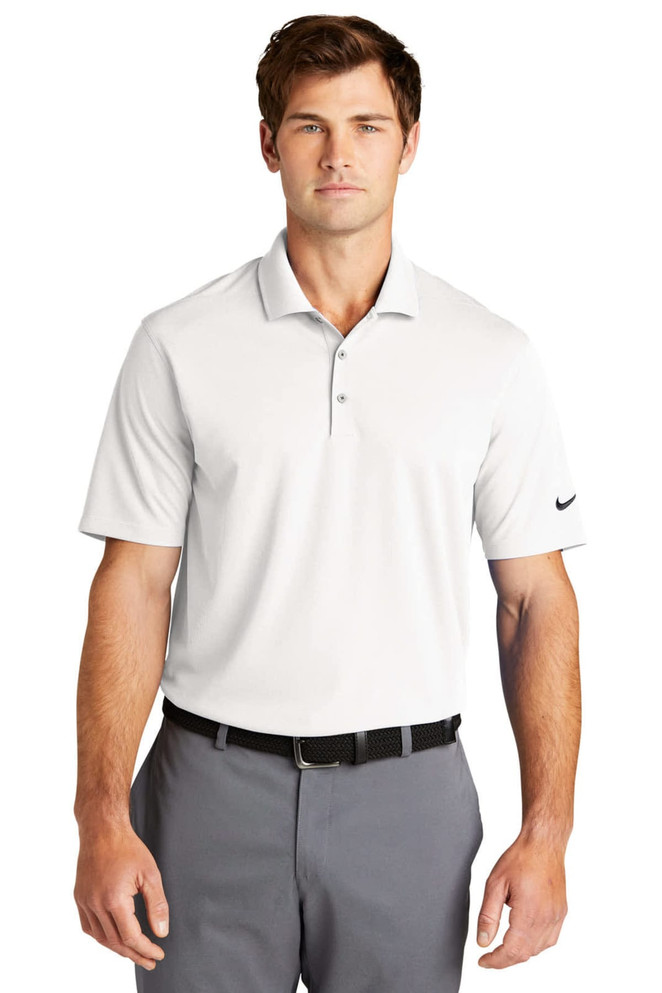 A light grey Nike Dri-FIT Micro Pique 2.0 Polo with a logo on the sleeve, featuring a classic collar and short sleeves.