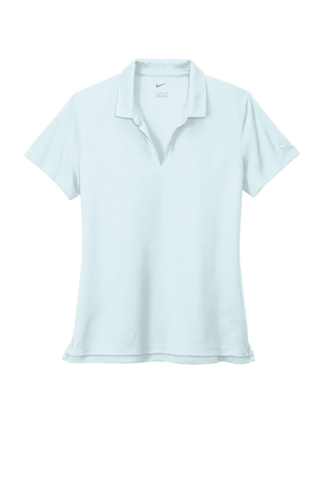 A light blue Nike ladies polo shirt with a collar and an emblem on the sleeve.