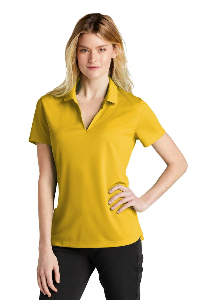 A yellow Nike Dri-FIT Micro Pique 2.0 Polo for ladies, featuring a logo and a modern fit.