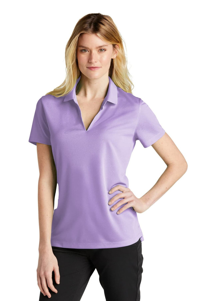 A lavender polo shirt for women with a collar and short sleeves, featuring a logo on the chest.