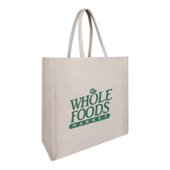 A beige canvas bag with two handles and a logo printed in green.