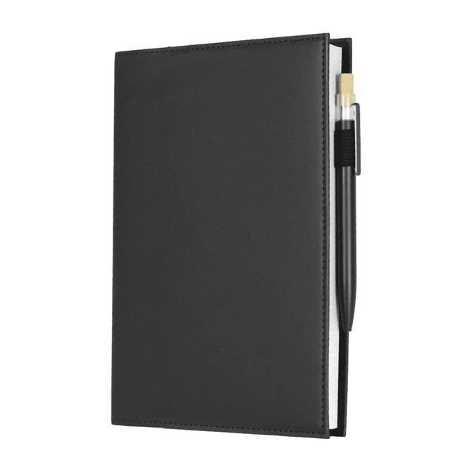 A black leather refillable journal with a pen attached, featuring a smooth cover and visible stitching.