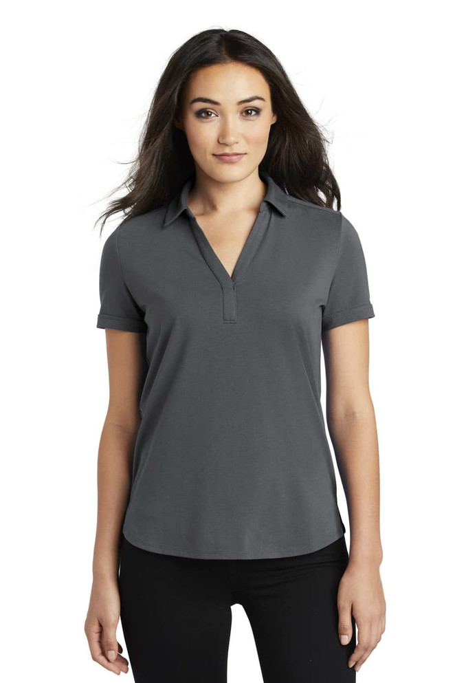 A grey polo shirt for ladies, featuring a collar and short sleeves, with a subtle logo.
