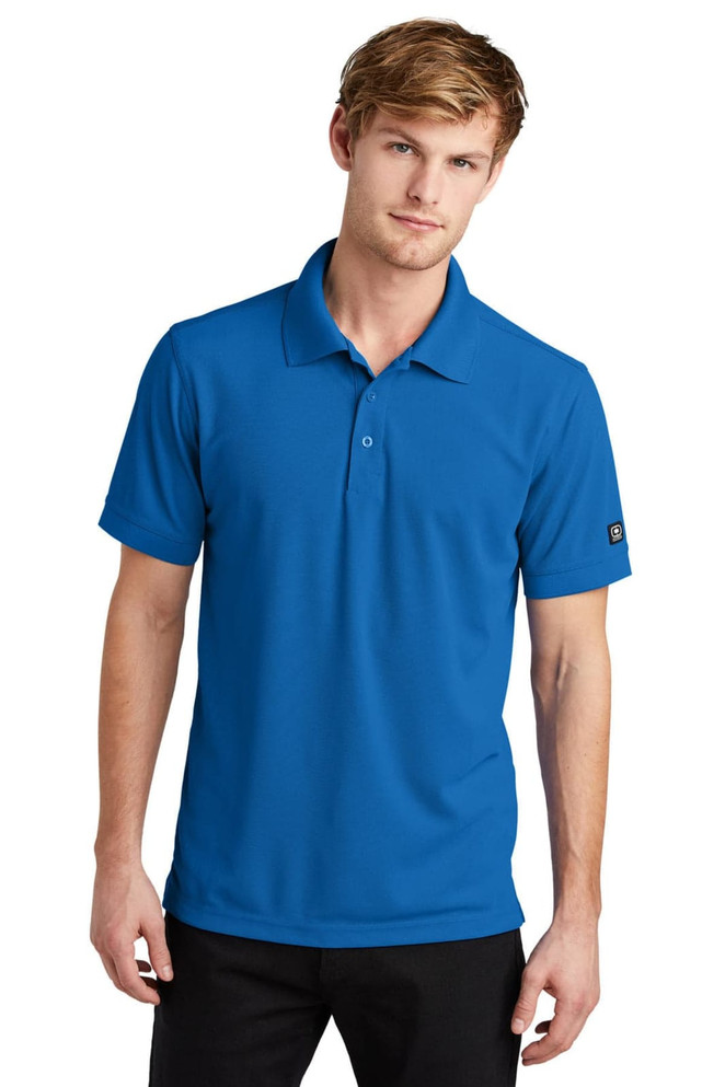 A blue polo shirt for men featuring a collar and a logo on one sleeve.