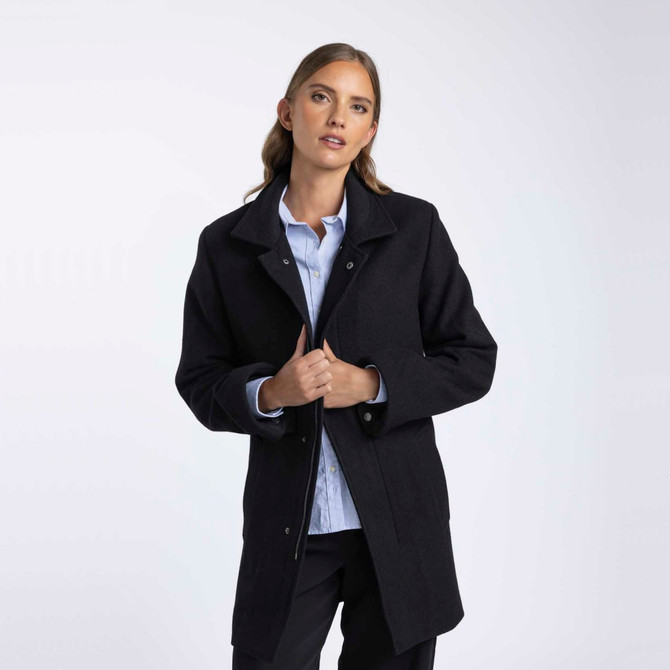 A wool jacket in black, featuring a collared neckline and button closure, worn by a model.