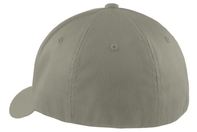A Flexfit cap in a light grey colour, featuring a rounded crown and a curved brim. It has a logo on the side.