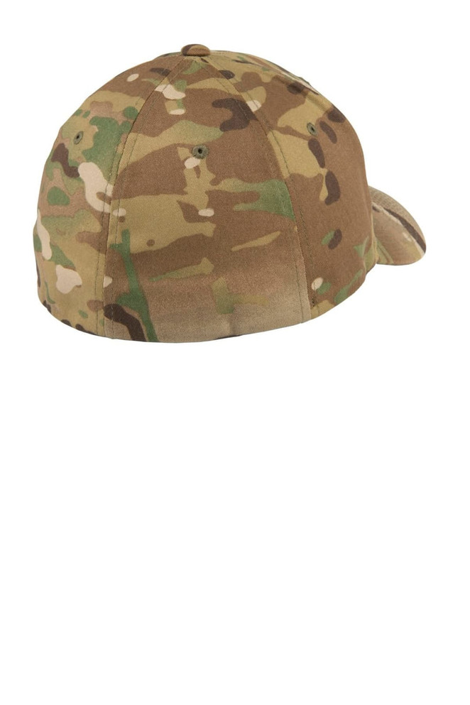 A camouflage Flexfit cap with a curved brim and vent holes at the back. Includes a branded logo.