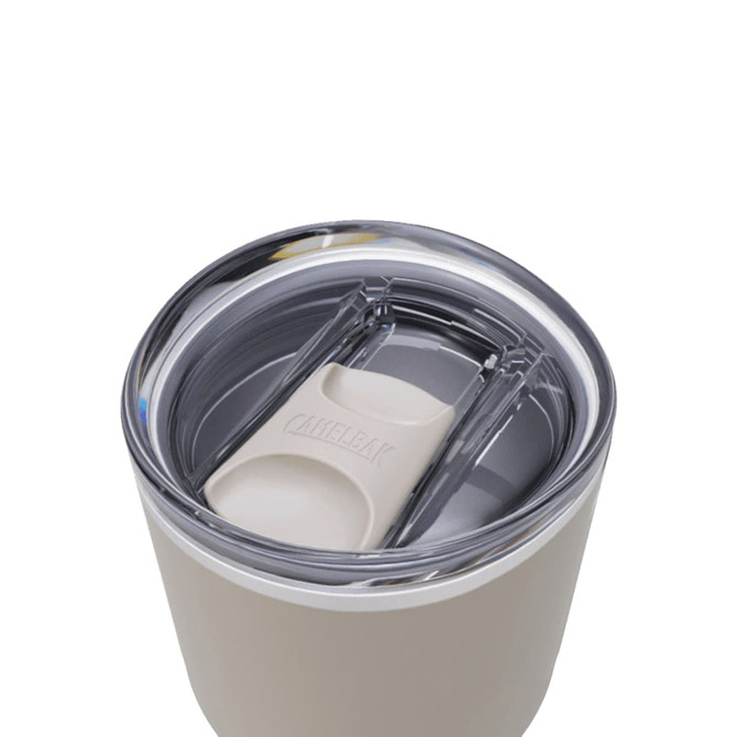 A drink bottle with a stainless steel body and a clear, sealed lid, featuring a logo. Primarily in light beige colour.