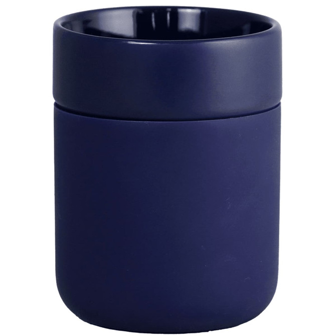 A ceramic tumbler in navy blue with a silicone wrap, featuring a smooth surface and a sleek design.