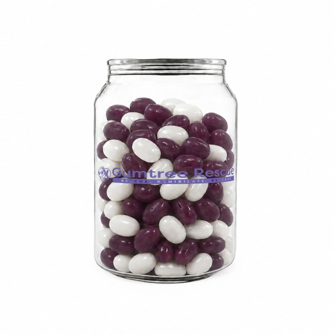 A clear jar filled with purple and white jelly beans, featuring a logo on the front.