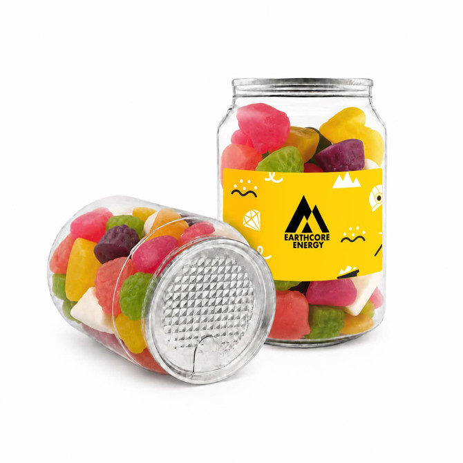 A clear canister containing colourful jelly sweets in various shapes and sizes. The canister features a logo.