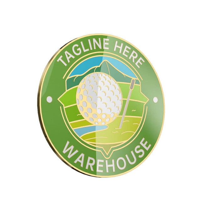 A green hard enamel ball marker featuring a golf ball and a picturesque landscape design, with a logo present.