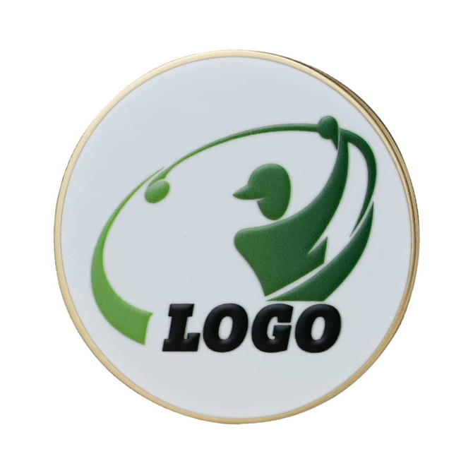 A circular ball marker with a green and white design featuring a player silhouette and a logo.