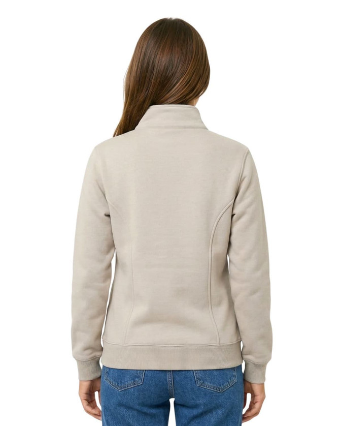 A light beige women's half zip fleece jumper, featuring a collar and fitted silhouette, viewed from the back.